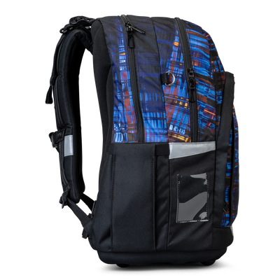 Side view of a Totem school backpack, with blue graphic panels, a side pocket and reflective tabs.