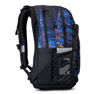 Side view of a Totem school backpack, with blue graphic panels, a side pocket and reflective tabs.