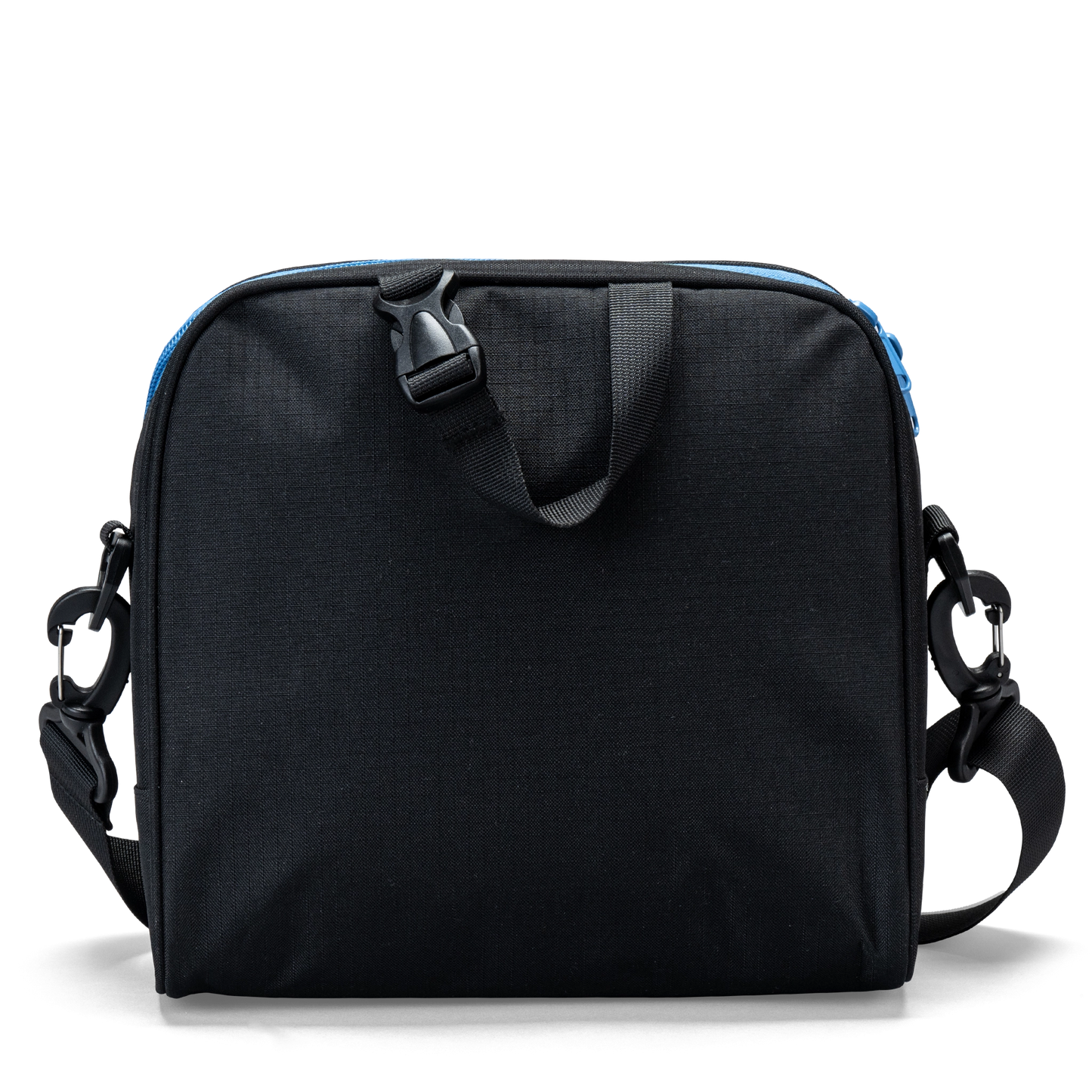 The carry handle on a black Totem lunch bag with detachable shoulder-strap clips.