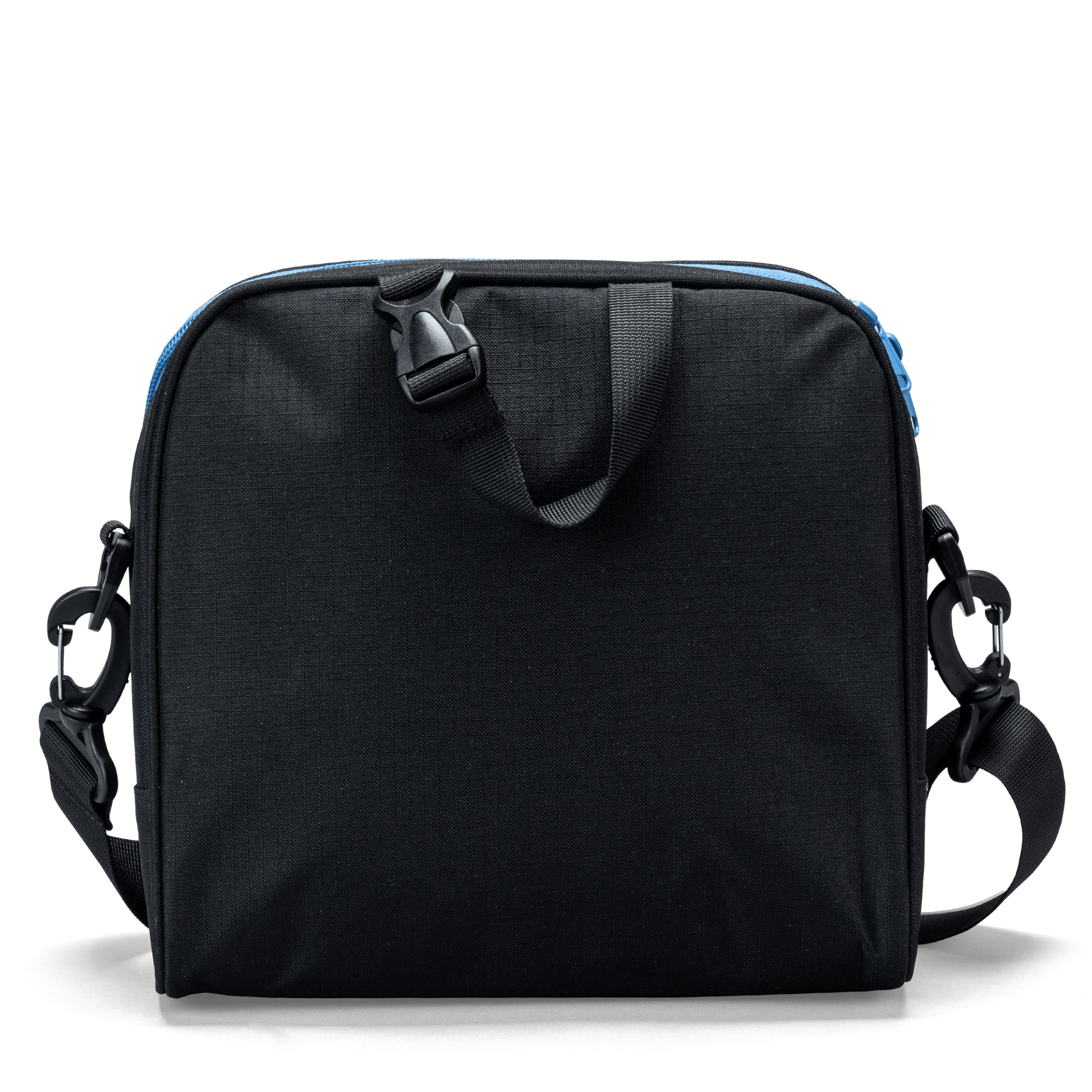 The carry handle on a black Totem lunch bag with detachable shoulder-strap clips.
