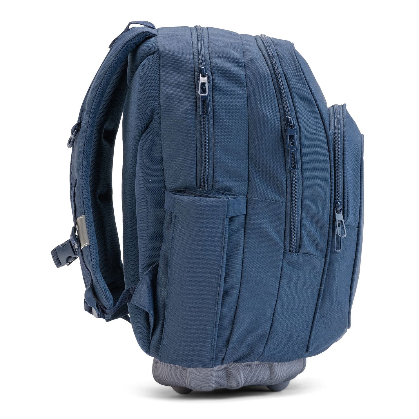 Side view of a navy Totem Bags school bag with three zip compartments, bottle pocket and moulded base.