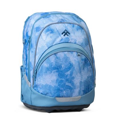 Totem's "Style Flow" which is a bright blue patterned backpack with a dark blue Totem logo | 2