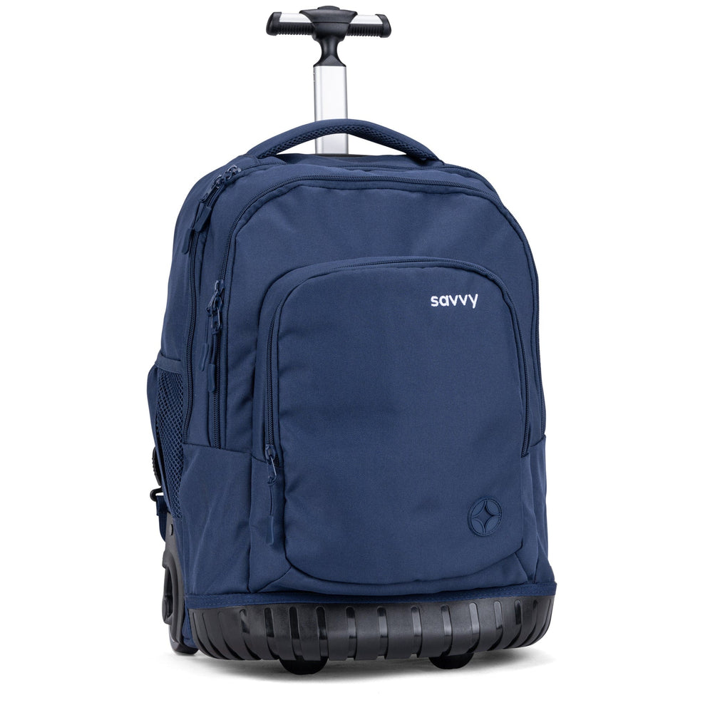 A front three-quarter view of the navy Savvy trolley backpack showing zip compartments, side pockets and the extended handle.