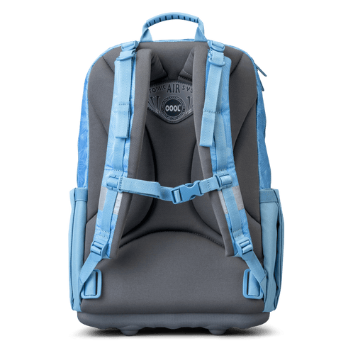 The back view of the light blue Totem ergonomic school backpack shows a padded back panel and adjustable straps.