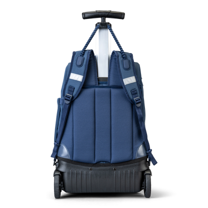 A back view of a Navy trolley bag with wheels and a handle that also has shoulder holders so that you can carry it on your back.