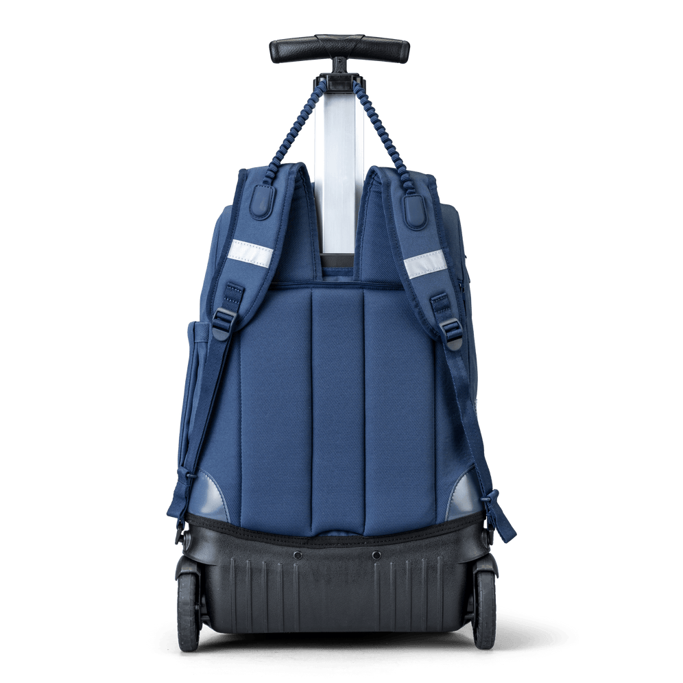 A back view of a Navy trolley bag with wheels and a handle that also has shoulder holders so that you can carry it on your back.