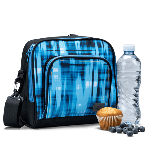 The front pocket on the blue geometric Totem lunch bag has a water bottle and a muffin.