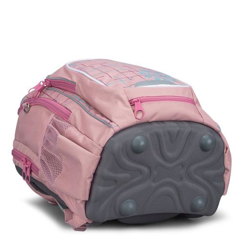 A close-up of the base of a pink Totem trolley school bag, featuring a sturdy grey moulded bottom with four protective feet.