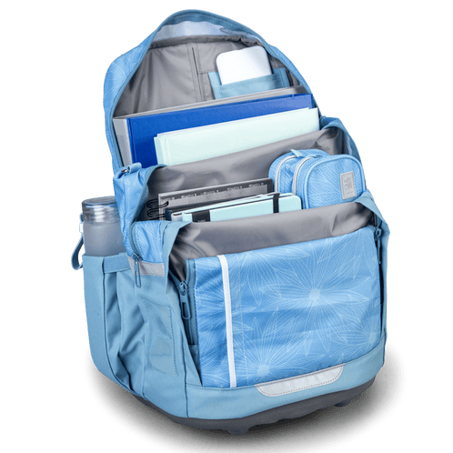 A light blue Totem wheeled school backpack was open and fully packed with files, textbooks, a pencil case and a water bottle.