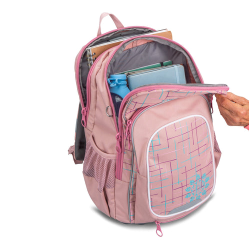An open pink Totem school bag neatly packed with books, a water bottle, and stationery, showing its main compartment.
