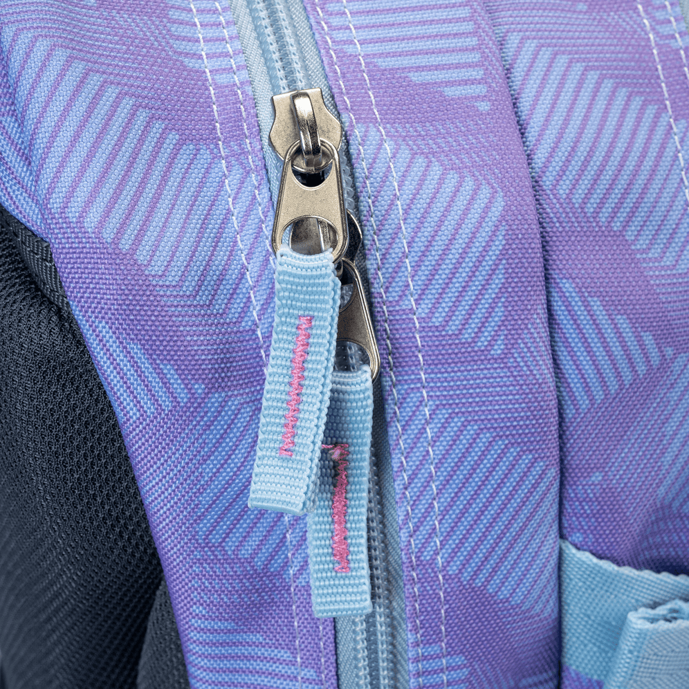 A closeup of two silver zipper pulls with light blue woven tabs on a purple and blue geometric-patterned school backpack.