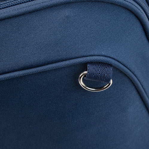 Close-up of a metal attachment on the navy Totem Bags school bag front pocket seam.
