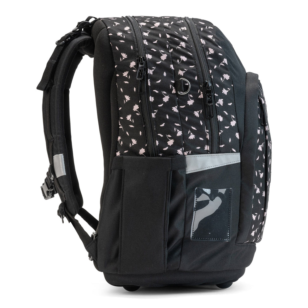 A side view of a black school bag with a pink floral pattern, a side pocket, and a reflective safety strip.