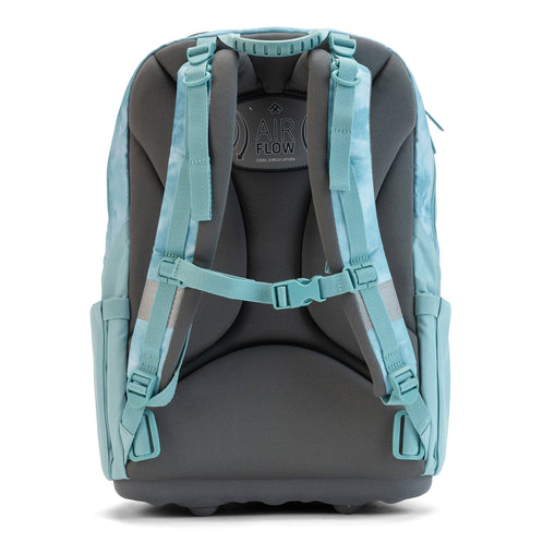 A rear view of a light blue tie-dye orthopaedic school backpack showing its padded ergonomic back panel.